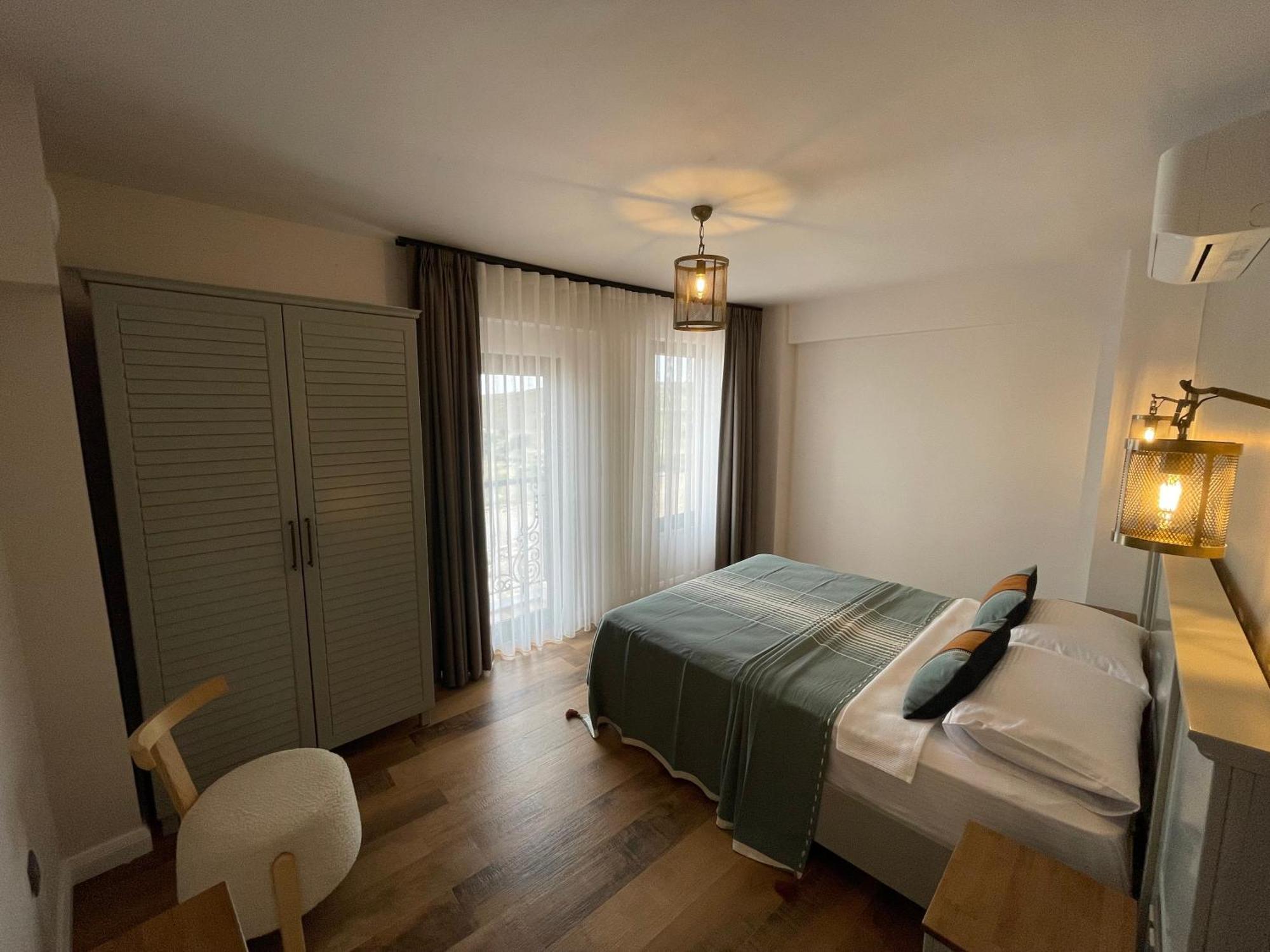Oikos Bozcaadaアパートホテル 部屋 写真